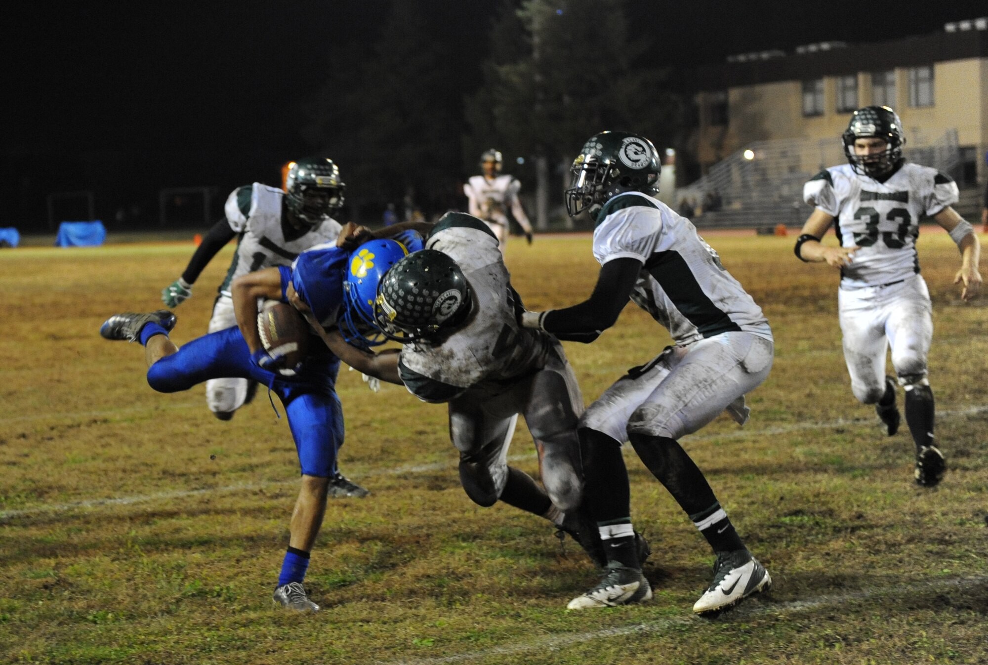 YOKOTA AIR BASE, Japan -- The Yokota Panthers and Kubasaki Dragons face-off during the Far East Championship game November 12, 2011. The Panthers defeated the Dragons 34-6 to clinch the Far East Division One title. (U.S. Air Force photo/Capt. Raymond Geoffroy)
