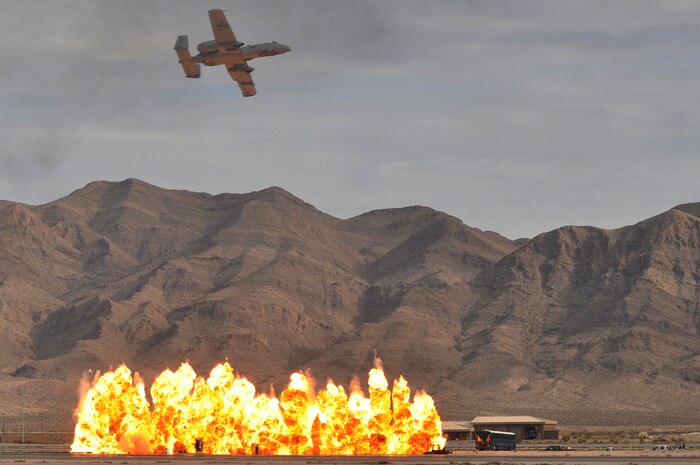 A U.S. Air Force A-10 Thunderbolt II, simulates its air to ground capabilities during the 2011 Aviation Nation Open House Nov. 12th, at Nellis Air Force Base, Nev.  Aviation Nation celebrates 70 years of airpower in Las Vegas and the Air Force's accomplishments in air, space and cyberspace. (U.S. Air Force photo by Tech. Sgt. Bob Sommer/Released)