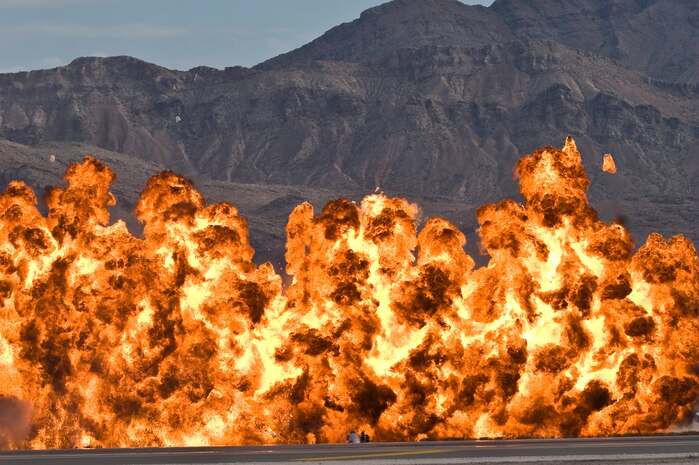 The pyrotechnics team utilized demolitions to mock the effects of ordnance dropped from aircraft during the 2011 Aviation Nation Open House Nov. 13, at Nellis Air Force Base, Nev. Aviation Nation celebrates 70 years of airpower in Las Vegas and the Air Force's accomplishments in air, space and cyberspace. (U.S. Air Force photo by Senior Airman Brett Clashman/Released)