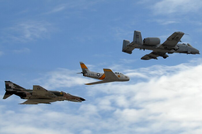 An F-4 Phantom, A-10 Thunderbolt II, and F-86 Sabere perform the Heritage Flight during the 2011 Aviation Nation Nov. 13th, at Nellis Air Force Base, Nev. Aviation Nation celebrates 70 years of airpower in Las Vegas and the Air Force's accomplishments in air, space and cyberspace. (U.S. Air Force photo by Staff Sgt. Taylor Worley/Released)