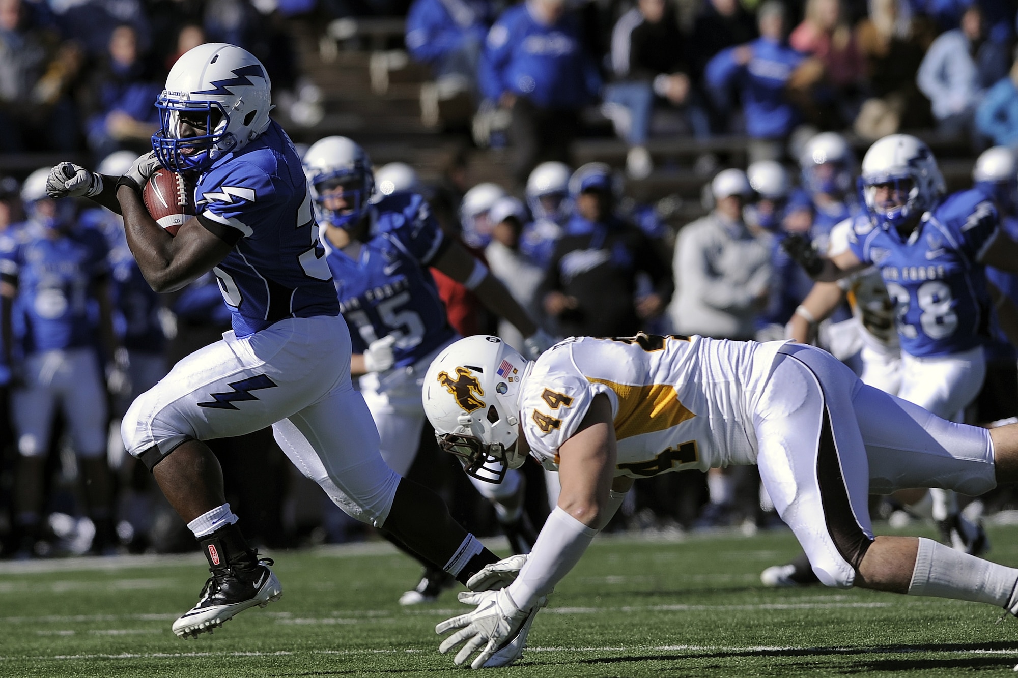 Junior running back Wes Cobb breaks free for yardage against the Wyoming Cowboys at Falcon Stadium Nov. 12, 2011, in Colorado Springs, Colo. The Cowboys defeated Air Force 25-17.    (U.S. Air Force photo/Mike Kaplan)