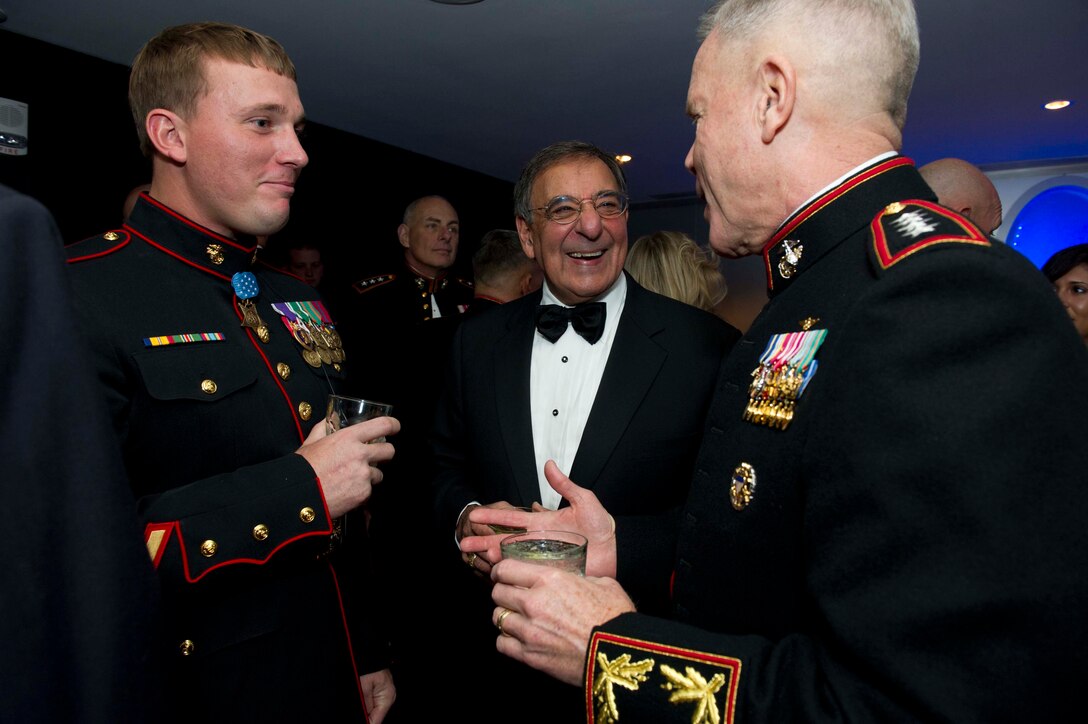 Defense Secretary Leon E. Panetta, center, and Marine Corps Commandant Gen. James F. Amos speak with Marine Corps Sgt. Dakota L. Meyer during the Commandant's Marine Corps Ball in National Harbor, Md., Nov. 12, 2011. Meyer is the most recent Marine Corps recipient of the Medal of Honor.