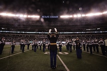 EAST RUTHERFORD, N.J. -- The United States Military Academy’s West Point Band performed at halftime during the New York Jets vs New Englad Patriots military appreciation game, Nov. 13. Marines, Sailors, Coast Guardsmen, Airmen and Soldiers unfurled an American Flag across the field during a pre-game ceremony as part of the Jets’ celebration of veterans. (Official Marine Corps photo by Sgt. Randall A. Clinton / RELEASED)