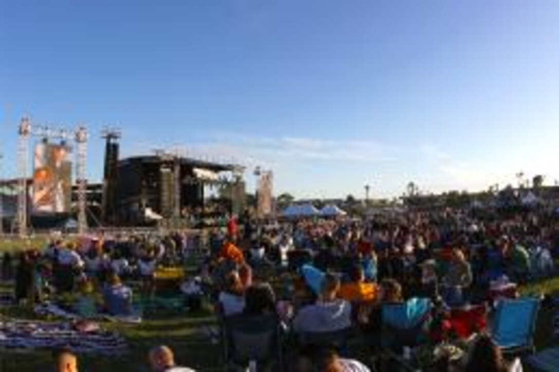 More than 27,000 gather for a free Tour for the Troops concert at Camp Pendleton's Paige Fieldhouse, Nov. 13. The event was sponsored by Air Force Reserve, TriWest Healthcare Alliance and Marine Corps Community Services to benefit the Tug McGraw Foundation.::r::::n::