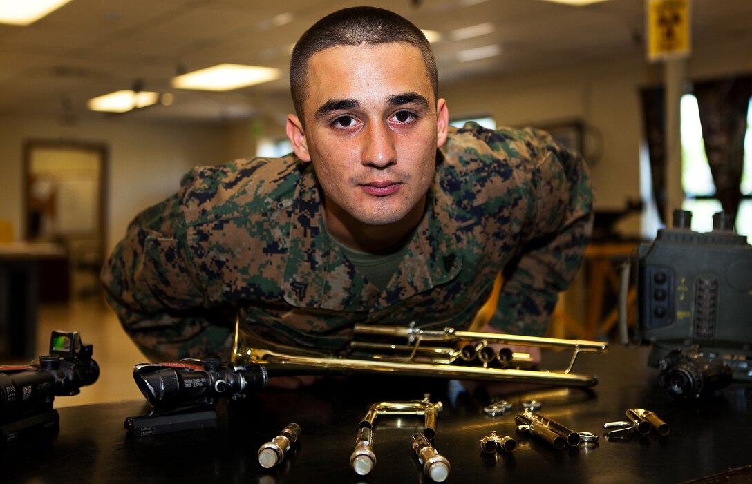 Cpl. Paul A. Tafoya, a trumpet player for the U.S. Marine Corps Forces, Pacific Band, still holds the military occupational specialty of an electro-optical ground ordnance repairer and technician. Tafoya received temporary additional duty orders to the band after proving to be a good musician and now travels throughout the Pacific for MarForPac.