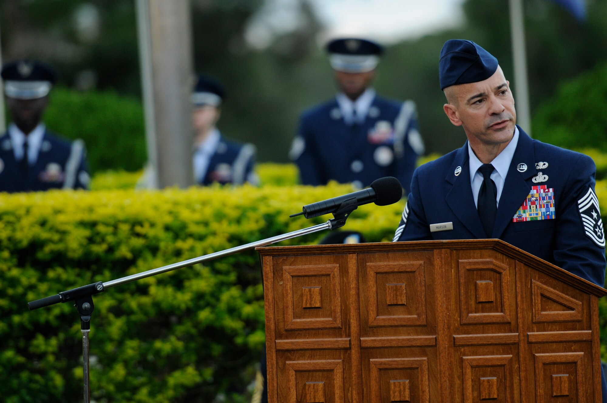 U.S. Air Force Chief Master Sgt. Mark Marson, 18th Wing command chief, gives a speech during the Veterans Day ceremony on Kadena Air Base, Japan, Nov. 11, 2011. During his speech, Marson spoke of the decade-long conflicts in the Middle East, the stress of deployments, the trials of family separation and the heroes who have served the nation with disregard for personal gain. (U.S. Air Force photo/Airman 1st Class Maeson L. Elleman/released)