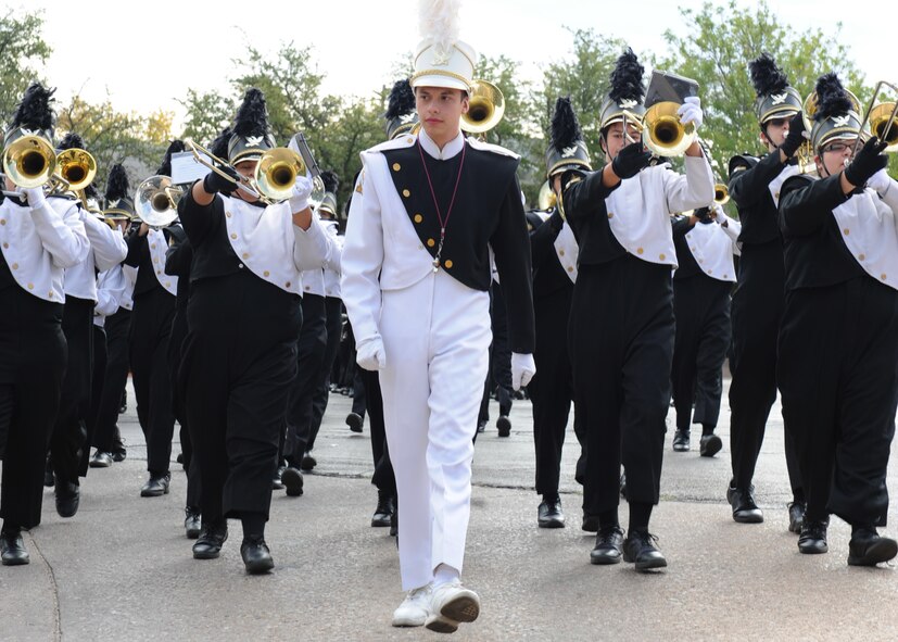 Abilene High School’s marching band performs at the Veterans Day Parade Nov. 12, 2011, in Abilene, Texas. First proclaimed on Nov. 11, 1919, Armistice Day celebrated the signing of the Armistice that ended World War I. It was expanded in 1954 to include veterans of all wars and has been known as Veterans Day ever since. (U.S. Air Force photo by Airman 1st Class Peter Thompson/Released)