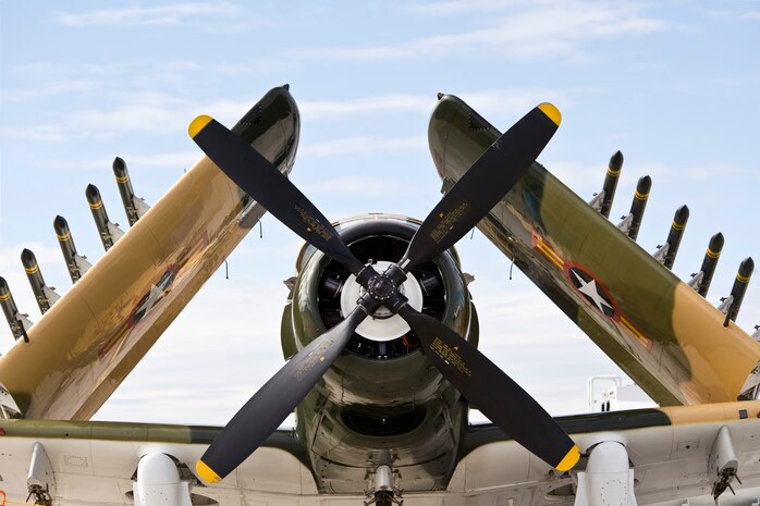 An A-1 Skyraider sits on the Nellis Air Force Base flight line during during the 2011 Aviation Nation Open House, Nov. 12, at Nellis Air Force Base, Nev. The A-1 Skyraider was an American single-seat attack  aircraft that saw service between the late 1940s and early 1980s. (U.S. Air Force photo by Lawrence Crespo/Released)