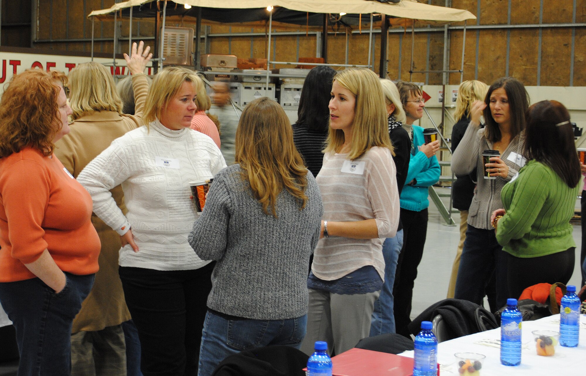 Members of the Great Falls CIVAIRES program visit with each other before a luncheon held Nov. 1. CIVAIRES is ap rogram for civilian and military spouses. (U.S. Air Force photo/Airman Cortney Paxton)