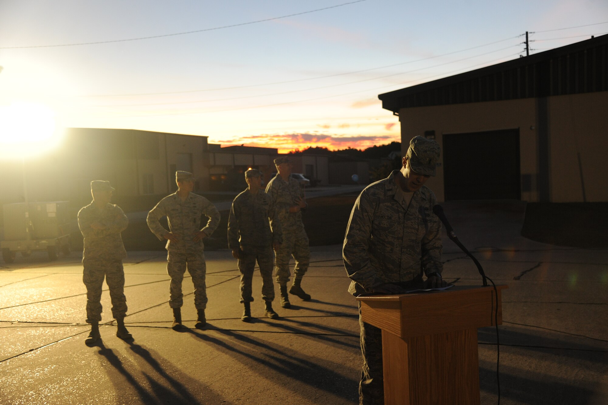 U.S. Air Force 1st Lt. Torry Holton, 820th Combat Operations Squadron parachute operator, speaks during a deployment return for 822nd Base Defense Squadron Airmen at Moody Air Force Base Ga., Nov. 12, 2011. Holton gave a brief speech about the unit’s mission in support of Operation New Dawn in Iraq. (U.S. Air Force photo by Airman 1st Class Paul Francis/Released)
