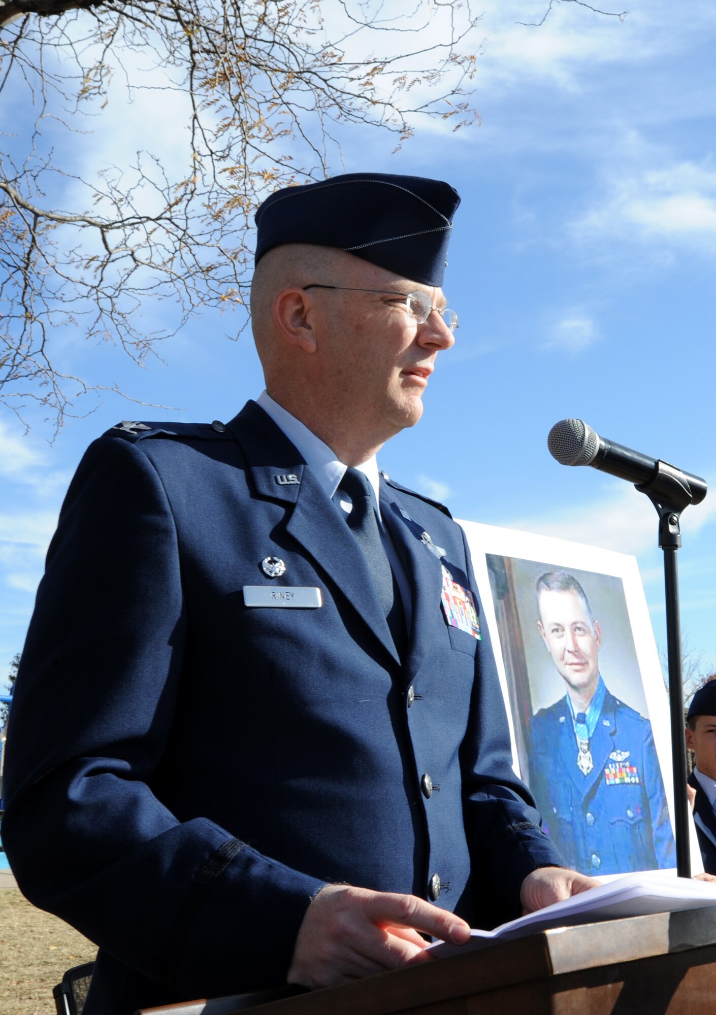 Col. Thomas Riney, 22nd Operations Group commander, tells “A Veteran’s Story,” about Col. Merlyn H. Dethlefsen during the dedication ceremony of the Derby Area Veterans Memorial – Walk of Freedom Nov. 11, 2011, Derby, Kan. Dethlefsen was the third Airman to receive a Medal of Honor during the Vietnam War. (U.S. Air Force photo/ Airman 1st Class Laura L. Valentine)