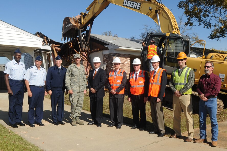 Team Shaw commanders, Forest City Military Communities leadership, and civilian construction contractors pose for a photo during the Family Housing Redevelopment Commencement here, Nov. 14, 2011. The first phase of construction involves building 192 homes and community amenities, destroying 680 homes and eventually providing 630 new residences by 2015. (U.S. Air Force photo by Airman 1st Class Hunter Brady/Released)