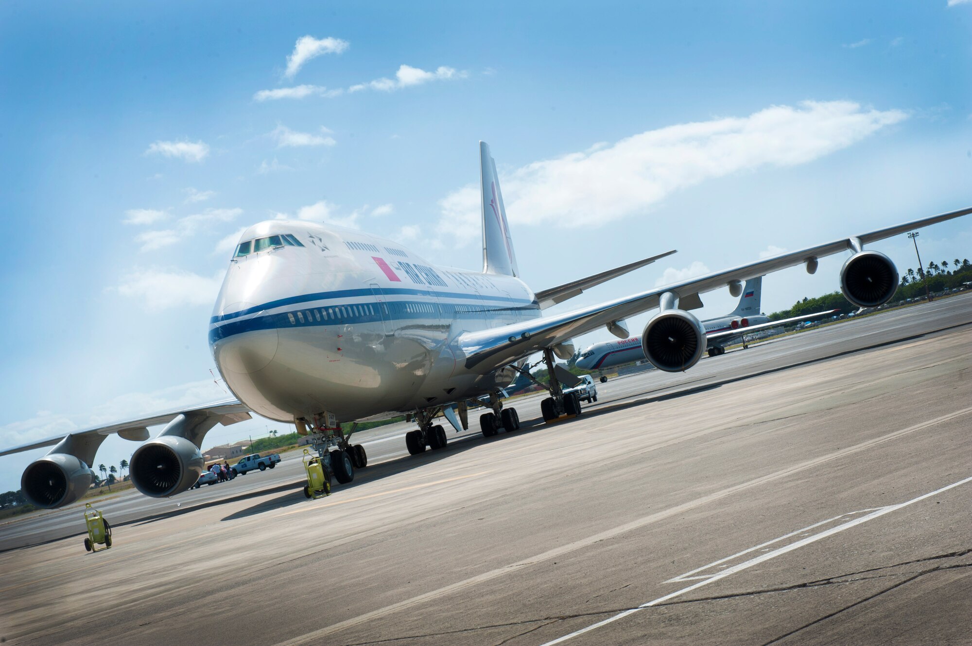 A Chinese Boeing 747 sits, parked on the 15th Wing flightline, Joint Base Pearl Harobr-Hickam, during the Asia Pacific Economic Corporation conference Nov. 12. APEC is the premier economic forum in the Asia-Pacific region. Established in 1989 and comprising 21 member economies from around the Pacific Rim, including the U.S., APEC fosters growth and prosperity by facilitating economic cooperation and expanding trade and investment throughout the region. (U.S. Air Force photo/Senior Airman Lauren Main)