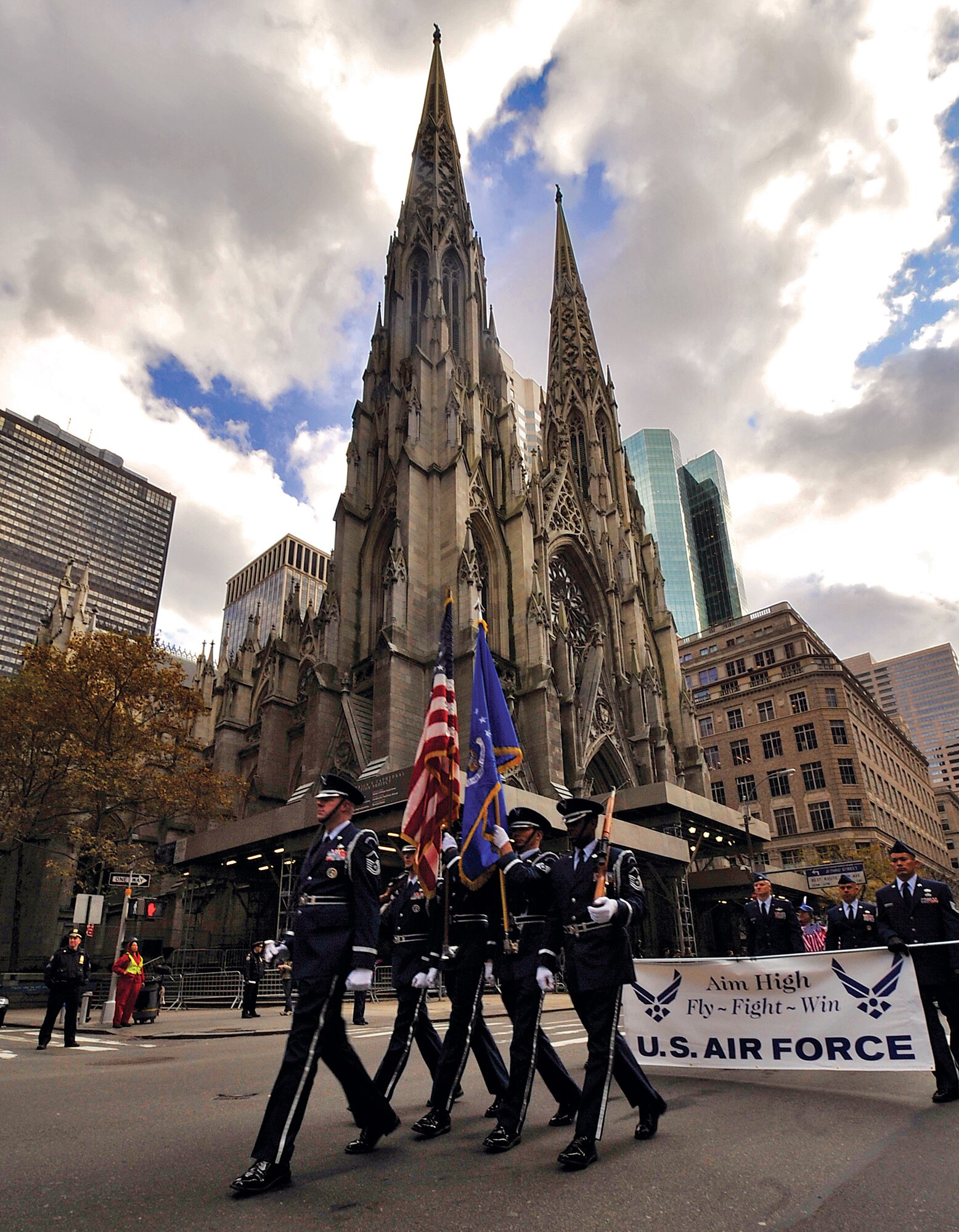 Reservists from the 514th Air Mobility Wing’s honor guard march in front of St. Patrick’s Cathedral on New York City’s 5th Avenue during the Big Apple’s Veterans Day parade Nov. 11, 2011. (U.S. Air Force photo/Shawn J. Jones)