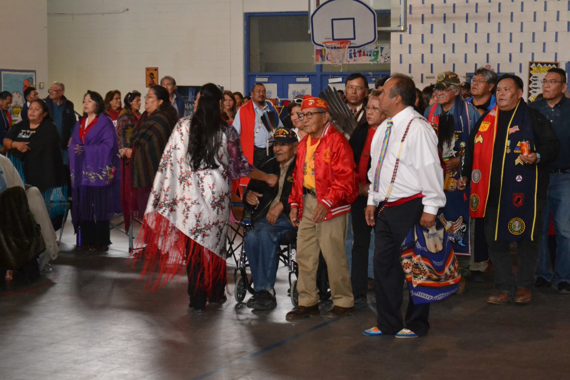 The Gourd Dance at the Navajo Nation Reservation in Shiprock, NM, honors Navajo Code Talkers Tom Jones (seated) and Dave Patterson. A Gourd Dance is traditional held on Veterans Day to celebrate and honor Native American veterans from tribes as far away as Oklahoma.