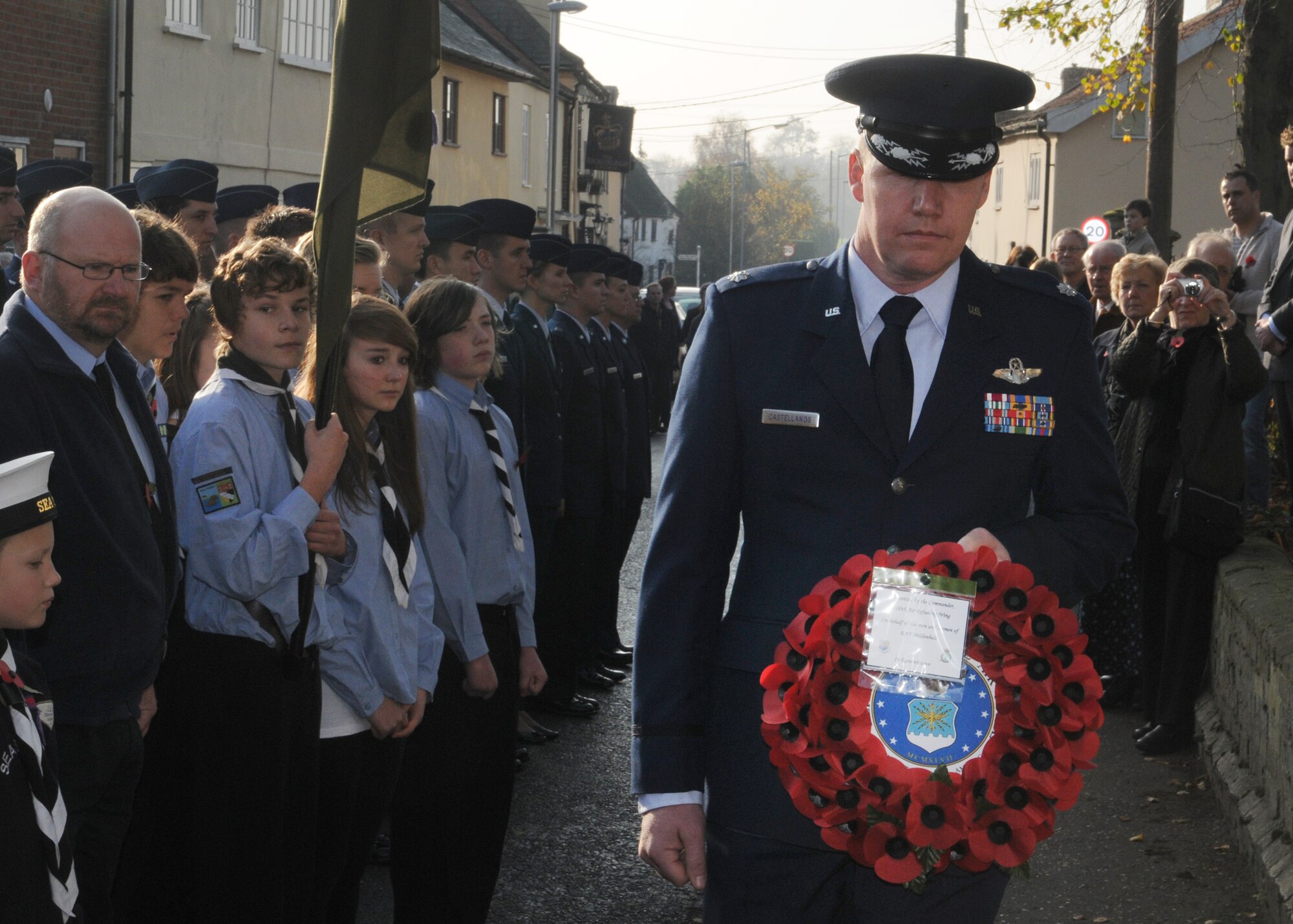 DICKLEBURGH, England – Lt. Col. Jonathon Castellanos, 351st Air Refueling Squadron director of operations, presents a wreath during a Remembrance Day ceremony Nov. 13, 2011.  Castellanos led a marching contingent of 351st ARS Airmen during a parade in honor of the men and women who gave their lives during World War I. (U.S. Air Force photo/Staff Sgt. Tabitha M. Lee)     