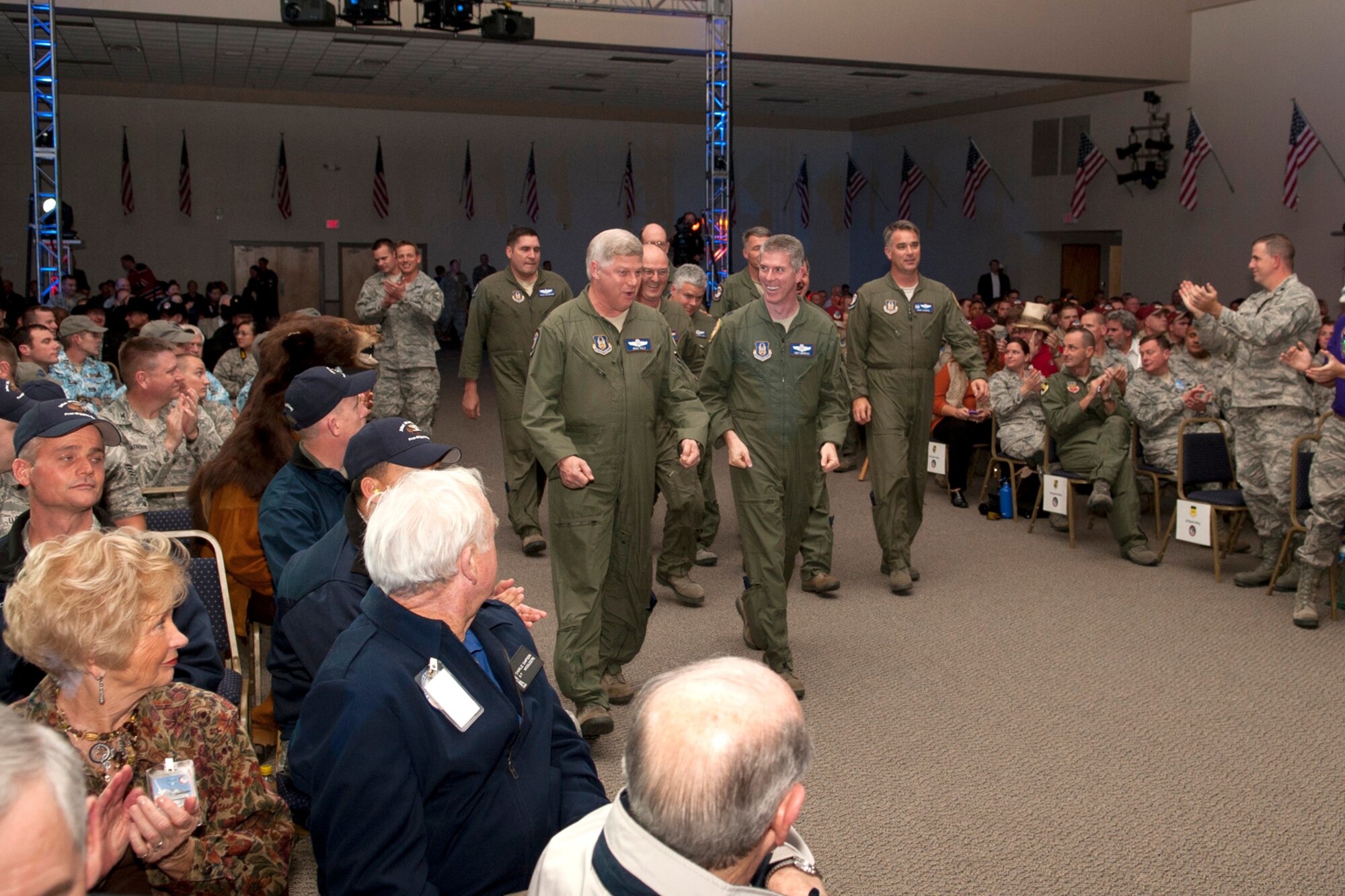 Members of the 93rd Bomb Squadron make their way to the stage after winning the LeMay Trophy during the Global Strike Challenge awards ceremony at Barksdale Air Force Base, La., Nov. 9, 2011. The Global Strike Challenge is the world's premiere bomber competition and the the LeMay Trophy is awarded to the best bomb squadron. (U.S. Air Force photo by Master Sgt. Greg Steele/Released)