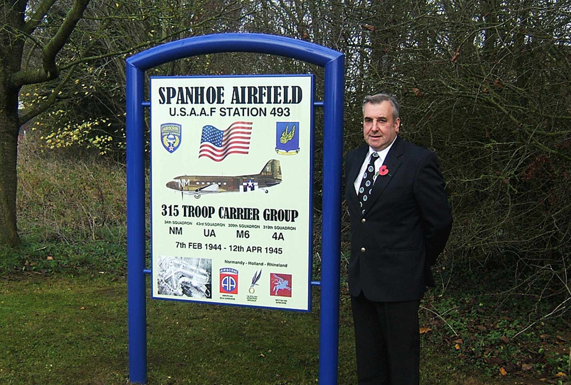 This weekend a new sign was placed at Spanhoe Field in the UK. The sign marks the airfield where the 315th Troop Carrier Group flew out of during WW II. In the picture is Stephen Barker, a good friend of the wing who donated the new sign. (courtesy photo)
