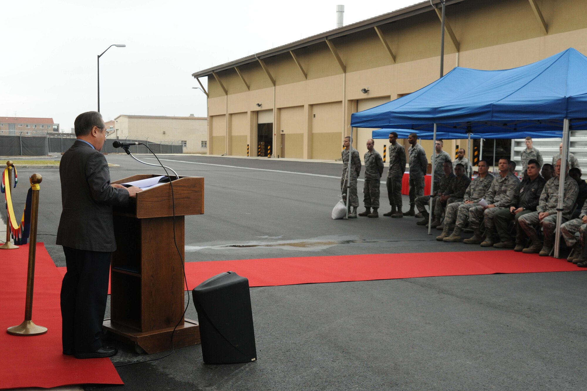 Imjoo Kim, Poong Chang Construction Company vice president, speaks during the ribbon cutting ceremony for the opening of a new maintenance complex at Kunsan Air Base, Republic of Korea, Nov. 9. The ceremony signifies the end of construction for the new Maintenance Complex Phases 1 and 3. (U.S. Air Force photo by Senior Airman Brittany Y. Auld/Released)