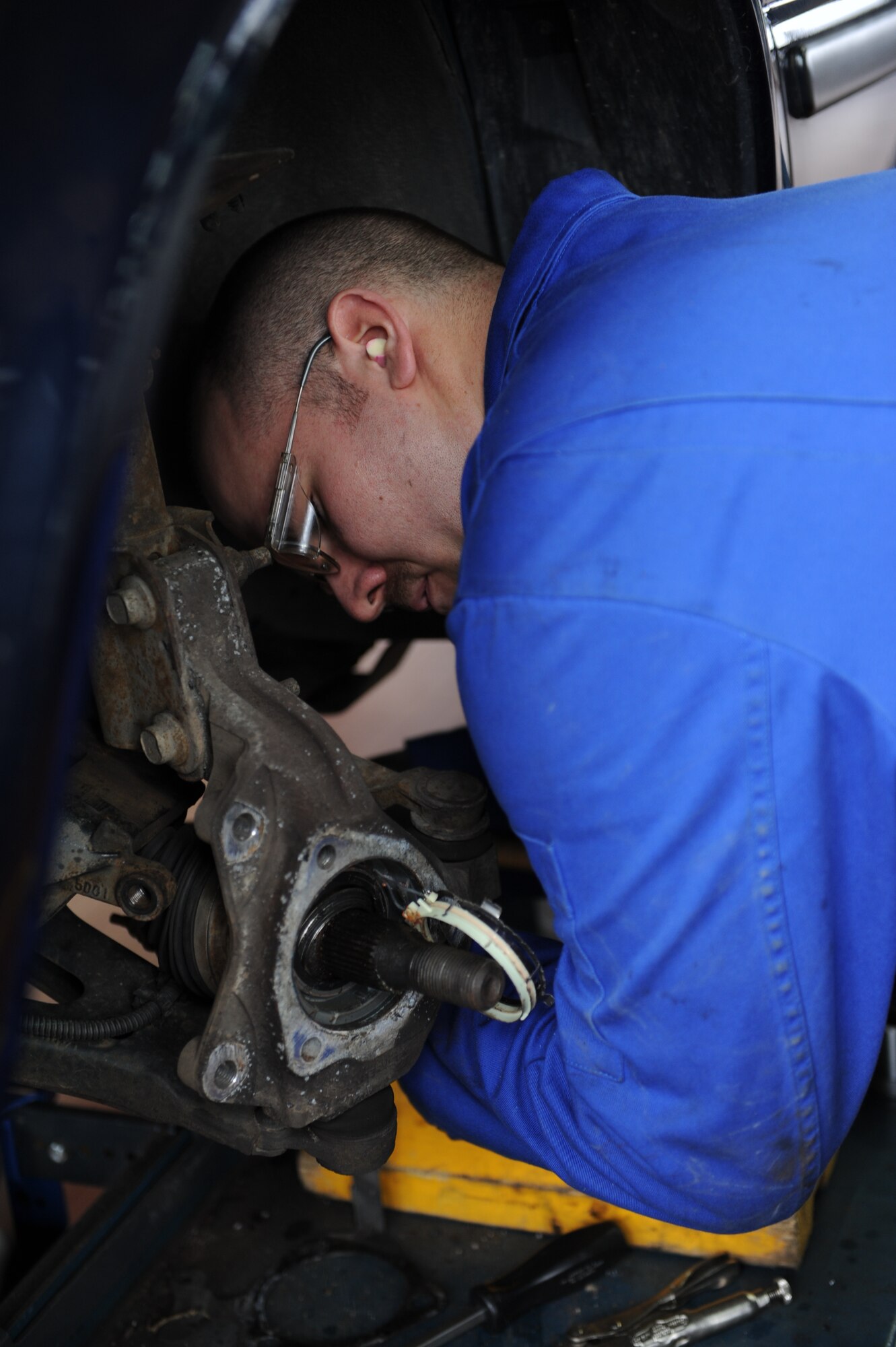 SPANGDAHLEM AIR BASE, Germany – Senior Airman Jeremy Yeater, 52nd Logistics Readiness Squadron vehicle equipment maintainer, removes a wheel hub from a government vehicle during an inspection of an anti-lock breaking system here Nov. 9. The 52nd LRS Vehicle Maintenance Flight is responsible for servicing all of the government vehicles on base to ensure Spangdahlem is mission ready. (U.S. Air Force photo/Senior Airman Christopher Toon)