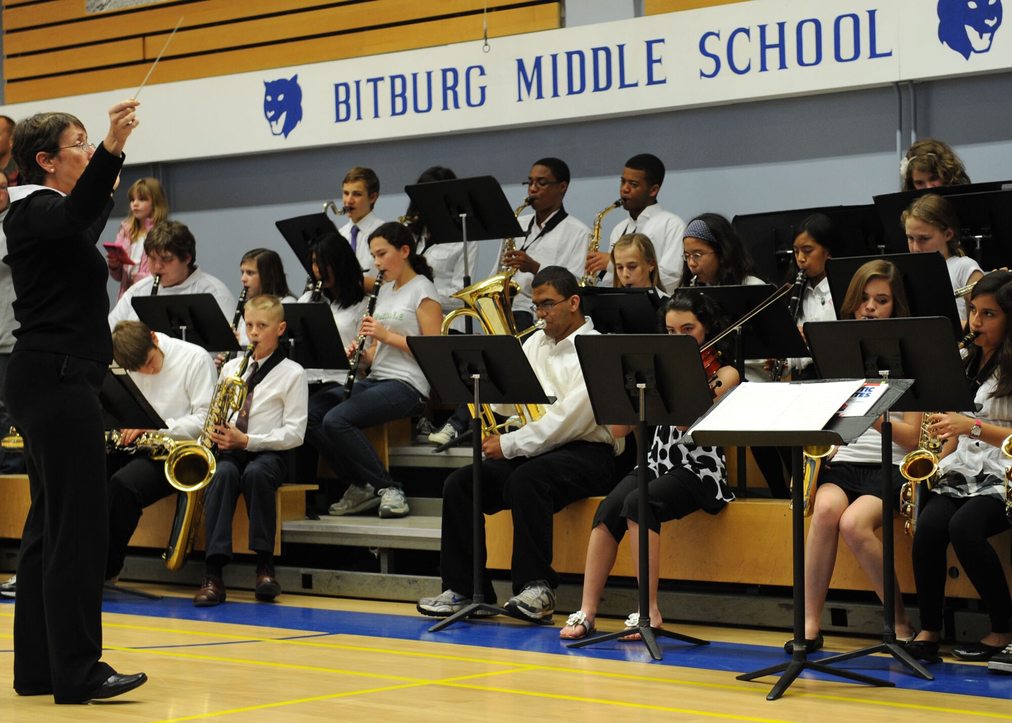 BITBURG ANNEX, Germany – Members from Bitburg middle and high School bands play “America, the Beautiful” and “My Country ‘Tis of Thee” during a Veterans Day ceremony at Bitburg Middle School Nov. 9. Veterans Day is an annual U.S. holiday honoring military veterans who have served in the military past and present. (U.S. Air Force photo/Senior Airman Christopher Toon)