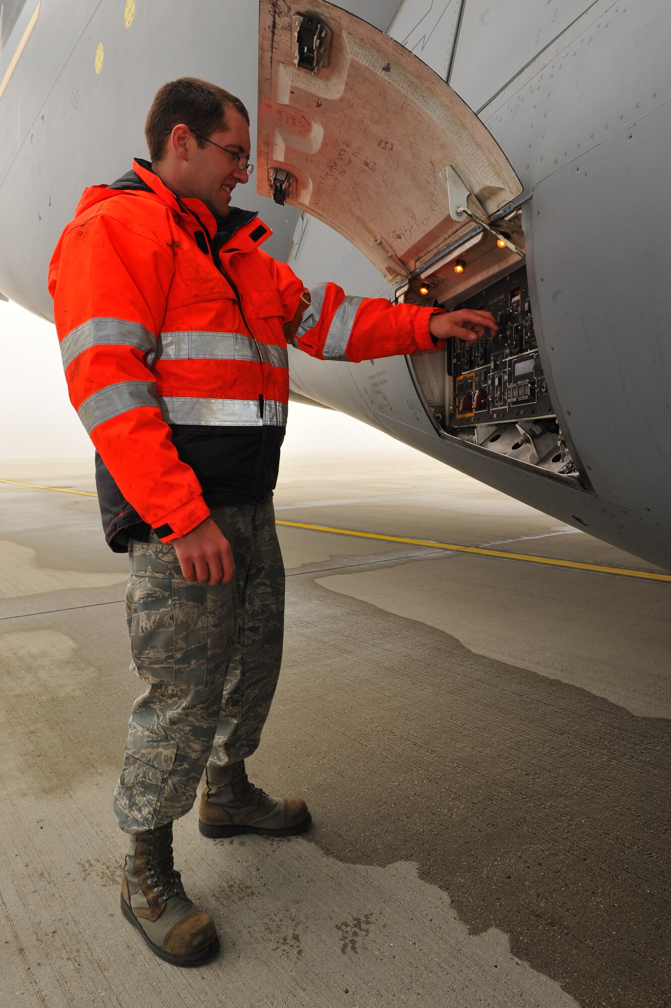 SPANGDAHLEM AIR BASE, Germany – Staff Sgt. Randle Johnson, 726th Air Mobility Squadron communication and navigation craftsman, checks the functionality of a refueling control board during a pre-flight inspection here Nov. 9. The 726th AMS is a strategic transit hub in Europe and provides support for heavy cargo aircraft and aircrews throughout the world. (U.S. Air Force photo/Airman 1st Class Dillon Davis)
