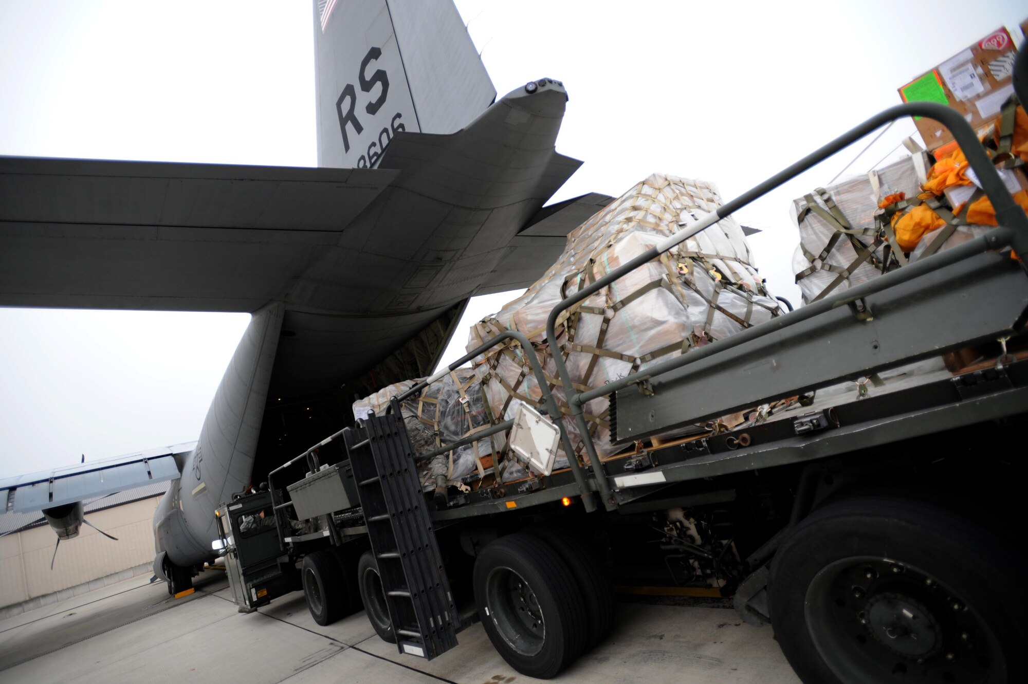 Pallets of humanitarian supplies are loaded onto a C-130J Super Hercules, Ramstein Air Base, Nov. 13, 2011. The effort is in support of the Turkey-led relief efforts following the Oct. 23, 2011, earthquake in Van province, Turkey. At the request of the Turkish government the Department of Defense has tasked U.S. European Command to airlift relief supplies to Van province. (U.S. Air Force Photo by Airman 1st Class Caitlin O?Neil-McKeown)    
