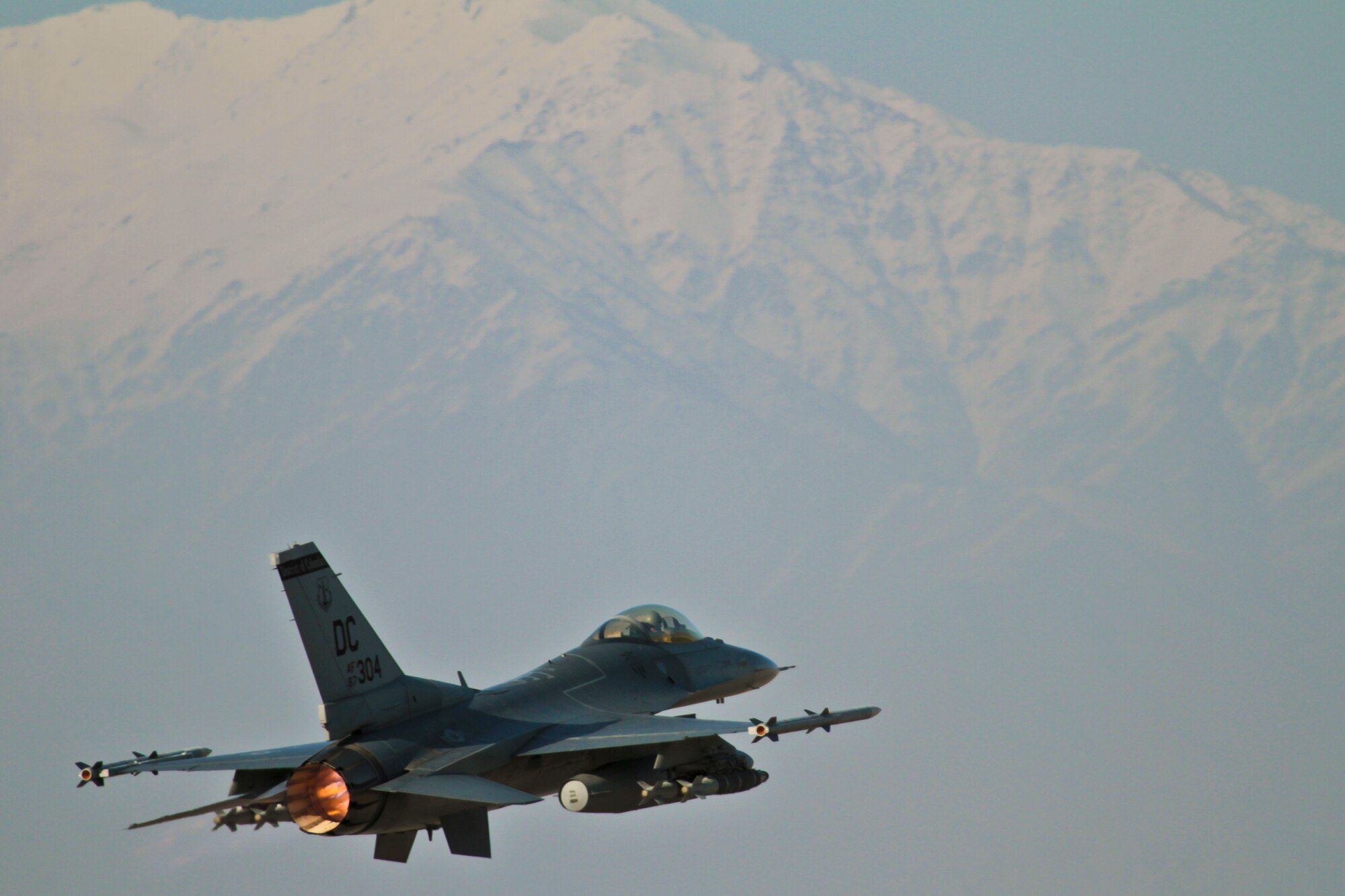 An F-16 Fighting Falcon takes off from Bagram Airfield Nov. 11, 2011. F-16 Fighting Falcons from the 121st Expeditionary Fighter Squadron and F-15s from the 335th EFS dropped more than 9,000 lbs of munitions through severe weather on enemy forces trying to overrun a combat outpost in Paktika province, Afghanistan, Nov. 8, 2011. Their efforts helped kill 70 insurgents and resulted in zero coalition casualties. (U.S. Air Force photo/Tech Sgt. Matthew Hecht)