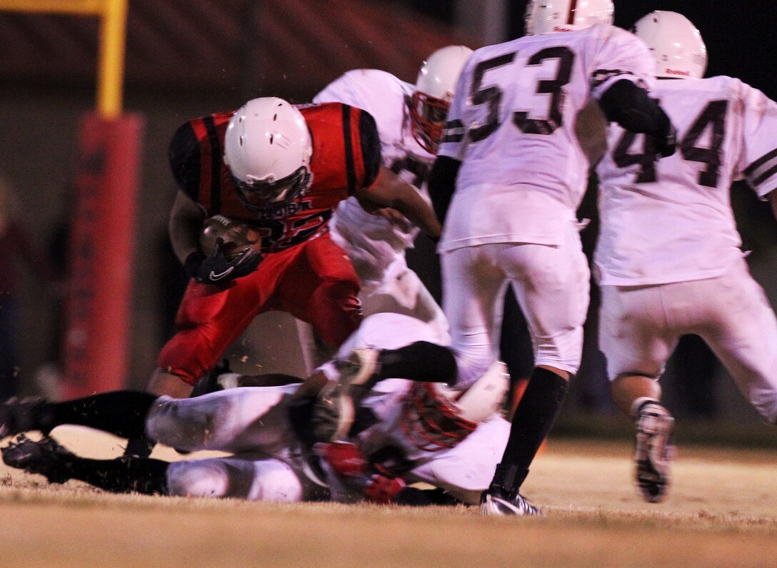 HQBN Bulldawg running back Guillermo Manzo, Bulldawgs, catches the ball for the first down Nov. 15, 2011.