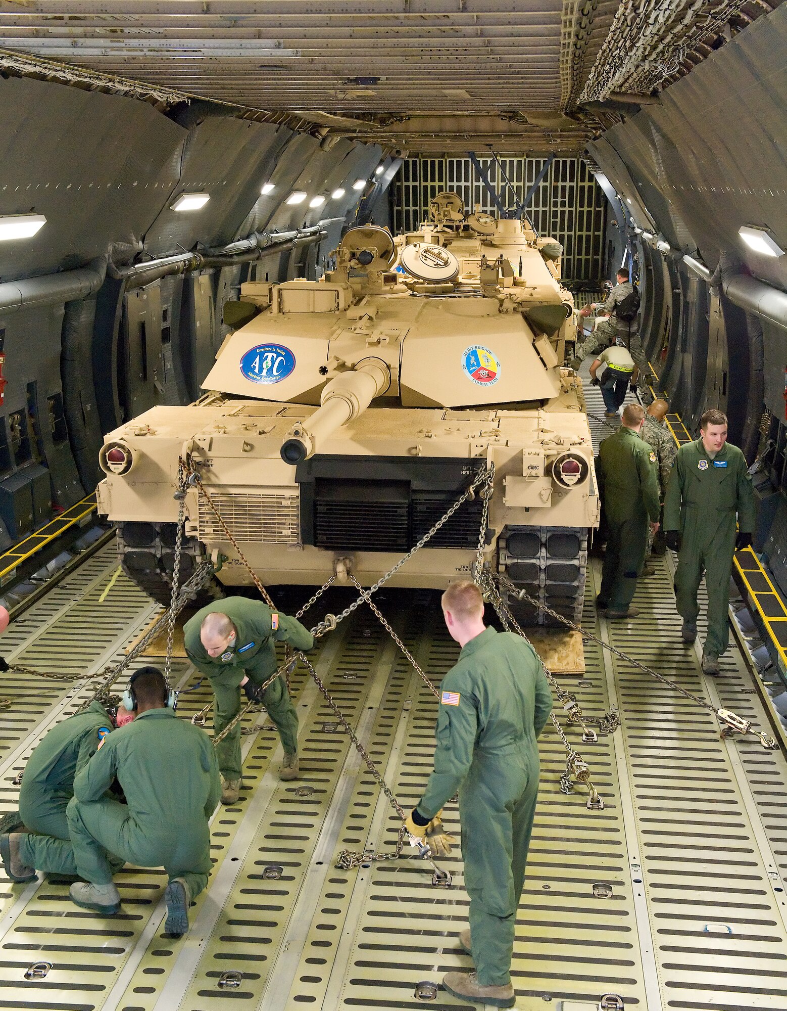 Loadmasters secure an M1 Abrams tank inside a C-5M Super Galaxy Nov. 15, 2011, at Dover Air Force Base, Del. (U.S. Air Force photo by Roland Balik)