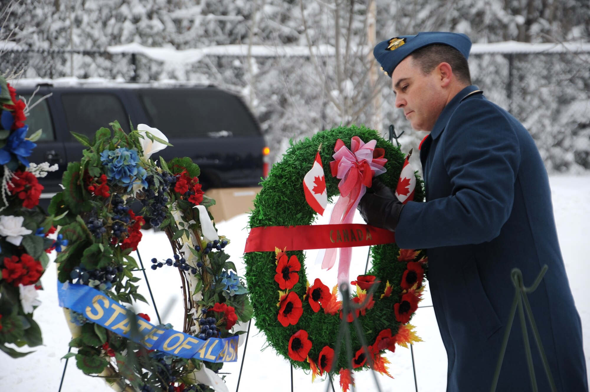 JOINT BASE ELMENDORF-RICHARDSON, Alaska -- Canadian Air Force Col. Dan Constable lays a wreath at a Veterans and Remembrance Day ceremony Nov. 11 at Fort Richardson's national cemetery. In Canada, Remembrance Day commemorates Canadians who died in the first and second world wars, Korean War, and peacekeeping duties. The first remembrance day was conducted in 1919 throughout the British Commonwealth. Constable is the Alaska NORAD Region deputy commander. (U.S. Air Force photo/Senior Airman Cynthia Spalding)