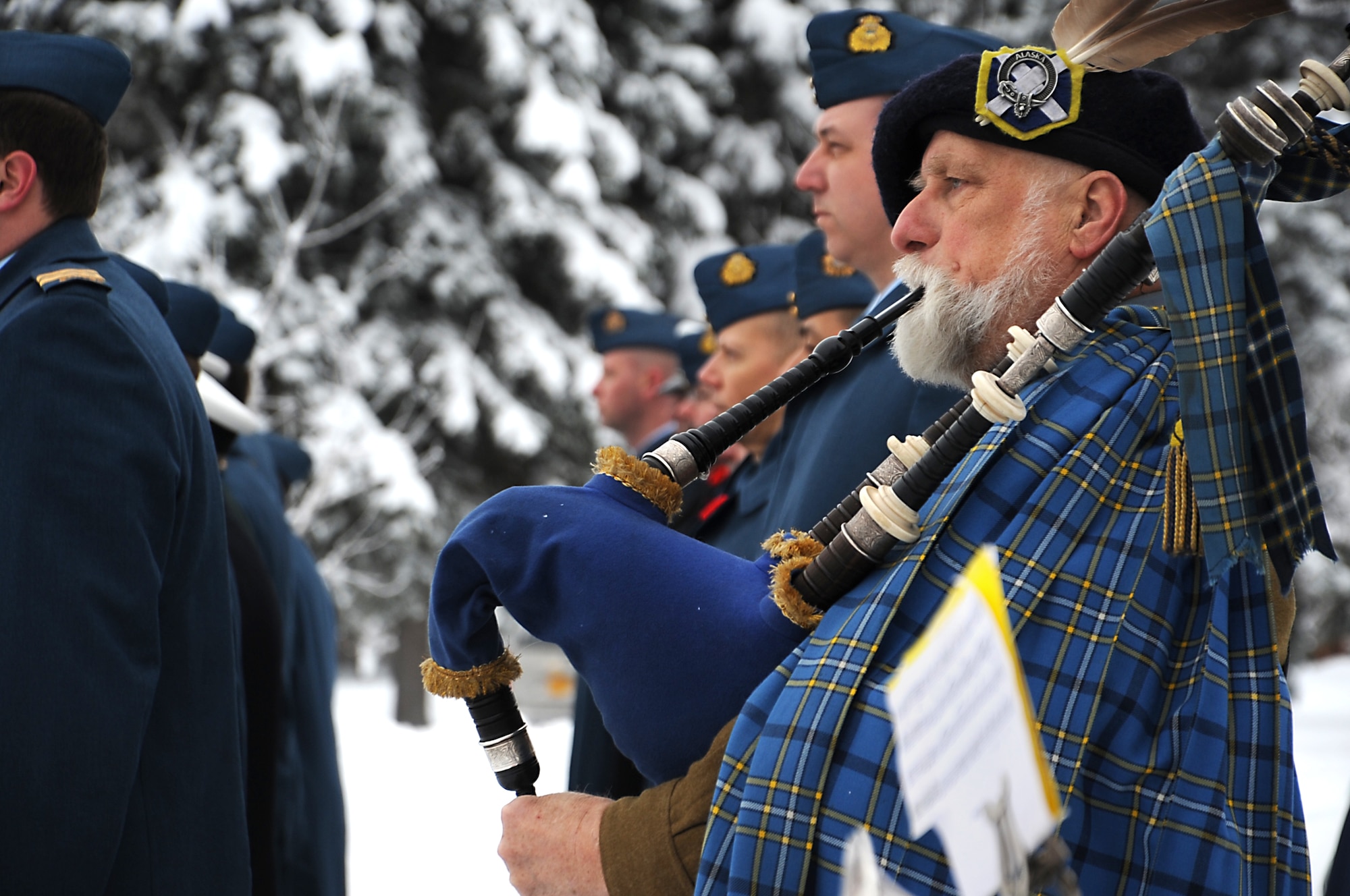 JOINT BASE ELMENDORF-RICHARDSON, Alaska -- Mr. Dan Henderson plays the bagpipe during the Remembrance Day ceremony at Fort Richardson National Cemetary Nov. 11, 2011. The first Rememberance Day was conducted in 1919 throughout the British Commonwealth. Henderson is a member of the Alaskan Highlanders. (U.S. Air Force photo/Senior Airman Cynthia Spalding)