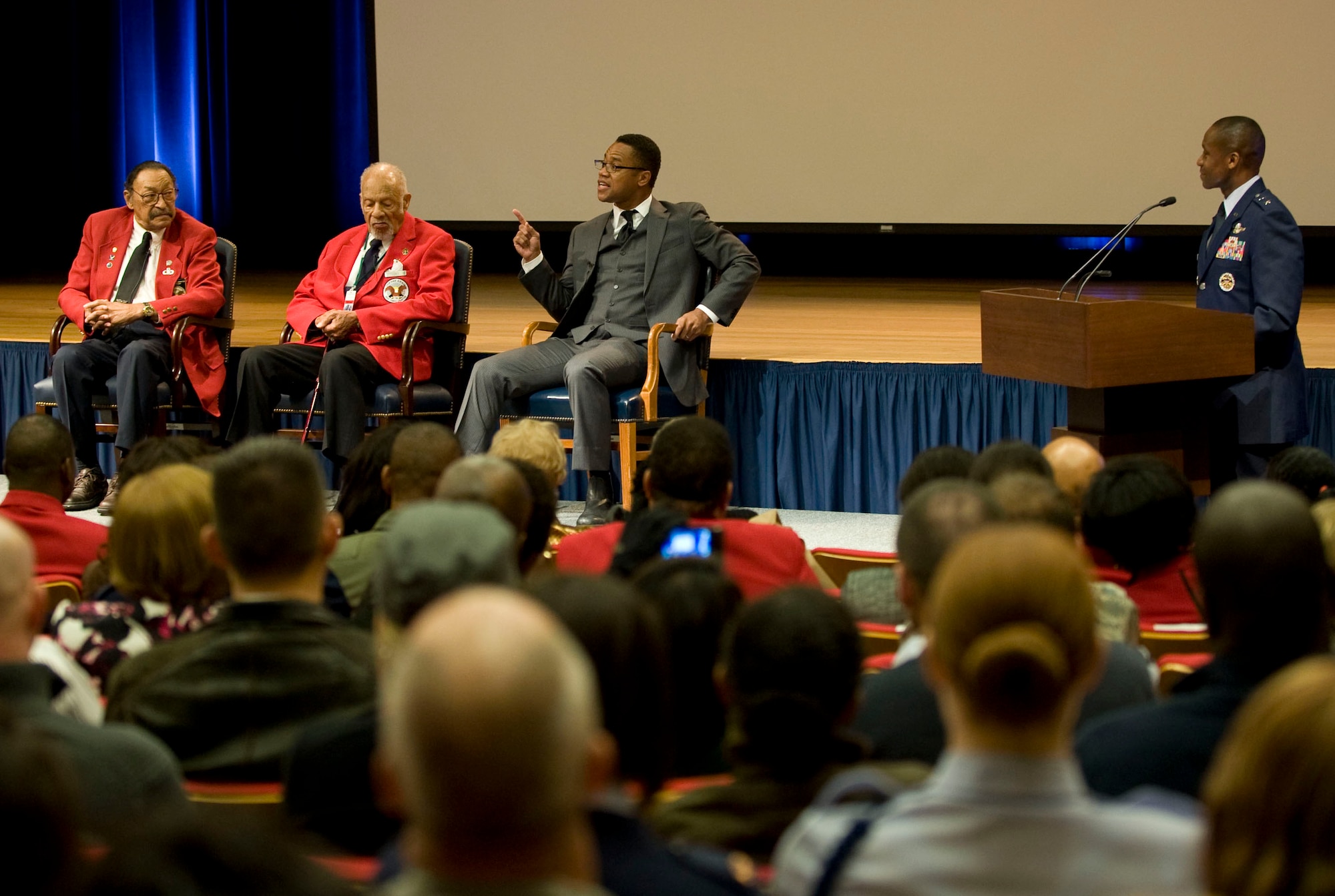 (lLeft to right) Tuskegee Airmen Lemuel Lewie Jr. and William Broadwater, actor Cuba Gooding Jr. and  Maj. Gen. Darren McDew answer questions after a screening of “Double Victory” Nov. 10, 2011, at the Pentagon. Lewie and Broadwater discussed their time as Tuskegee Airmen and the struggles they faced with overseas’ enemies and racism at home during World War II. Mc Dew is the commander of the Air Force District of Washington . (U.S. Air Force photo/Staff Sgt. Tiffany Trojca) 