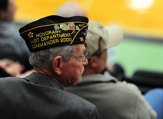 WARRENSBURG, Mo. -- A World War II veteran listens to the opening remarks during a Veterans Day ceremony at the University of Central Missouri’s multi-purpose center Nov. 11. Veterans Day, formerly known as Armistice Day, is an annual U.S. holiday honoring military Veterans. Its date marks the anniversary of the German signing of the Armistice at the 11th hour of the 11th day in 1918, ending major hostilities of World War I. More than 70 Vietnam War veterans participated in the ceremony at UCM. (U.S. Air Force photo/Senior Airman Nick Wilson)