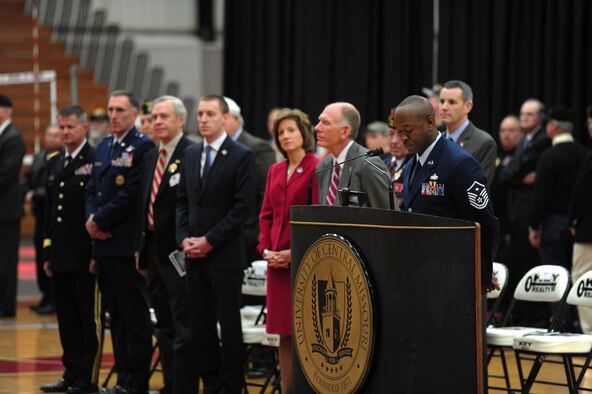 WARRENSBURG, Mo.  -- Master Sgt. Randolph Wyatt, 509th Maintenance Operations Squadron first sergeant, speaks to recognize the era of Vietnam Veterans during a Veterans Day ceremony at the University of Central Missouri’s multi-purpose center Nov. 11. Veterans Day, formerly known as Armistice Day, is an annual U.S. holiday honoring military Veterans. Its date marks the anniversary of the German signing of the Armistice at the 11th hour of the 11th day in 1918, ending major hostilities of World War I. More than 70 Vietnam War veterans participated in the ceremony at UCM. (U.S. Air Force photo/Senior Airman Nick Wilson)