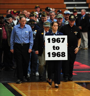 WARRENSBURG, Mo.  -- Vietnam War Veterans who served from 1967 to 1968 march during a Veterans Day ceremony at the University of Central Missouri’s multi-purpose center Nov. 11. Veterans Day, formerly known as Armistice Day, is an annual U.S. holiday honoring military Veterans. Its date marks the anniversary of the German signing of the Armistice at the 11th hour of the 11th day in 1918, ending major hostilities of World War I.  More than 70 Vietnam War veterans participated in the ceremony at UCM. (U.S. Air Force photo/Senior Airman Nick Wilson)