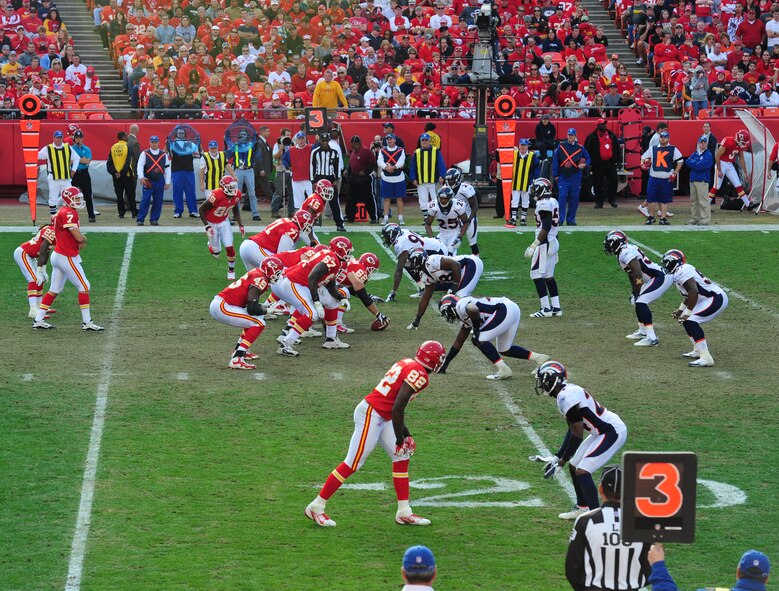 KANSAS CITY, Mo. -- Players from the Kansas City Chiefs offense, left, and Denver Broncos Offense, right, square off as the K.C. Chiefs attempt to gain first down yardage on third down at Arrowhead Stadium Nov. 13. The Broncos beat the Chiefs 17-10 to clinch a week-long American Football Conference West lead. (U.S. Air Force photo/Senior Airman Nick Wilson)