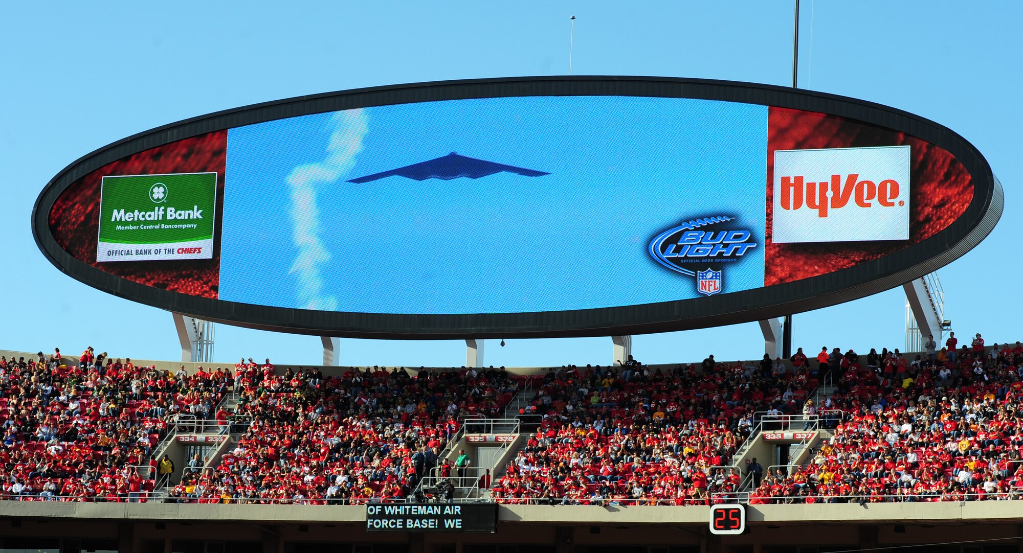 KANSAS CITY, Mo. -- A B-2 Spirit from the 509th Bomb Wing, is displayed on the large screen as it flies over Arrowhead Stadium during the national anthem here Nov. 13. Air Force flyovers take place at various sporting events to demonstrate air power, increase Air Force interest, stir patriotism and recruit future Airmen. (U.S. Air Force photo/Senior Airman Nick Wilson)