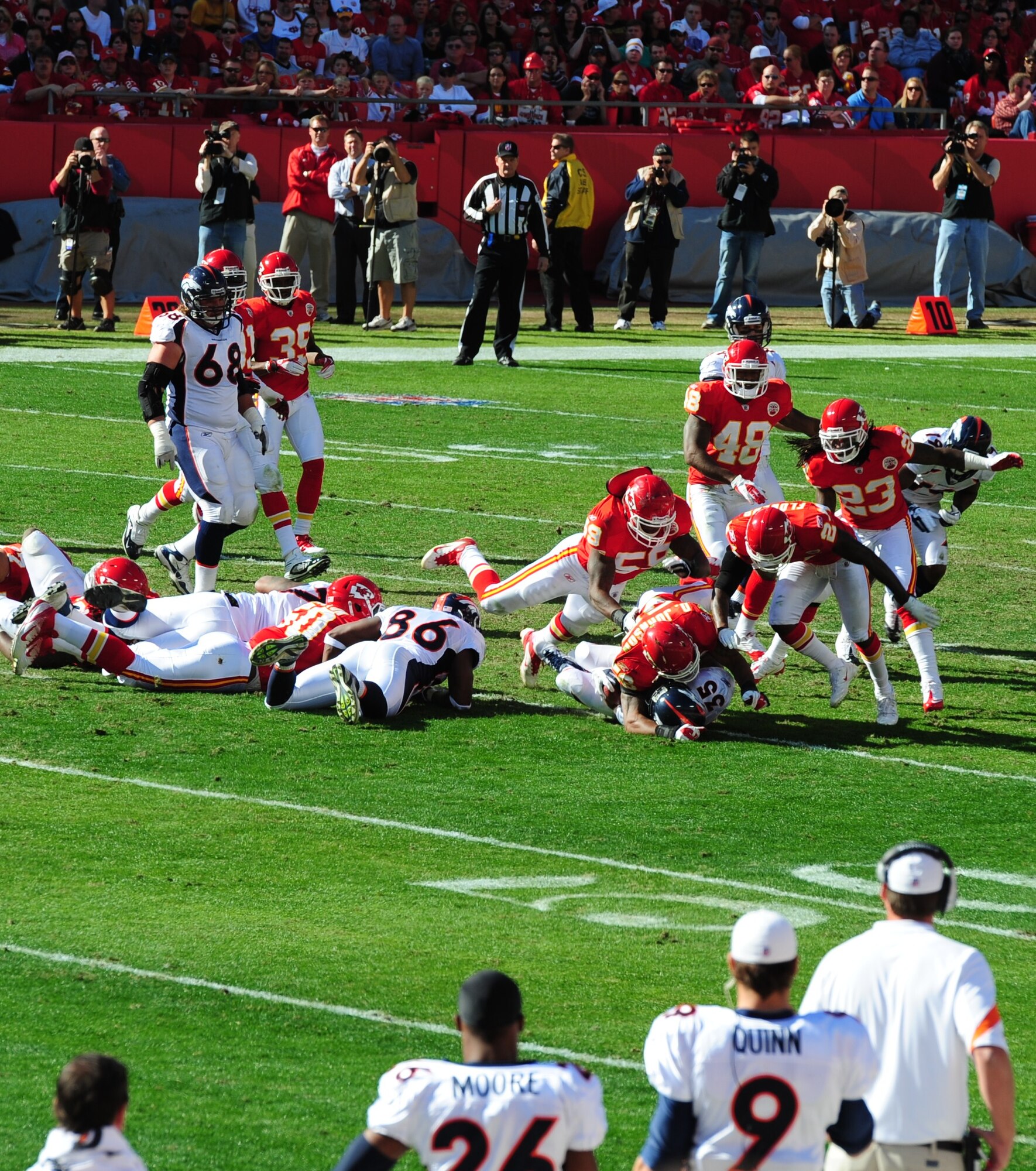 KANSAS CITY, Mo. -- A Denver Broncos running back is tackled after a five yard gain by players from the Kansas City Chiefs defense at Arrowhead Stadium Nov. 13. The Broncos beat the Chiefs 17-10 to clinch a week-long American Football Conference West lead. (U.S. Air Force photo/Senior Airman Nick Wilson))