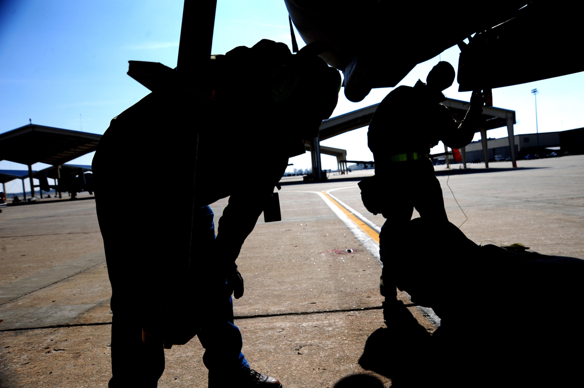 Weapons loaders from the 442nd Aircraft Maintenance Squadron update aircraft forms after a gun is loaded onto an A-10 Thunderbolt II here Nov. 4. These forms are updated every three to four days. (U.S. Air Force photo/Senior Airman Nick Wilson)