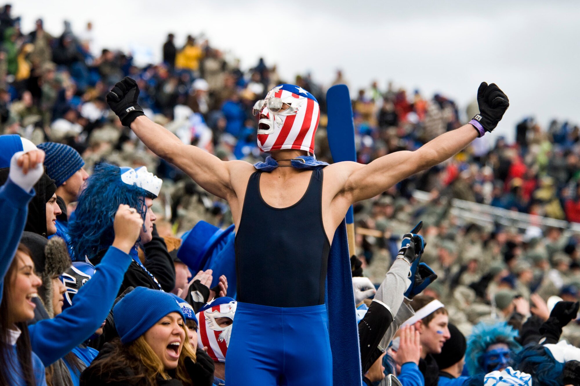 An Air Force Academy cadet celebrates after the Falcons victory over the Knights at the Air Force Academy, Colo., Nov. 5, 2011. With the win, the Falcons retained the Commander-in-Chiefs trophy for the second consecutive year. (U.S. Air Force photo by Airman Alystria Maurer/Released)