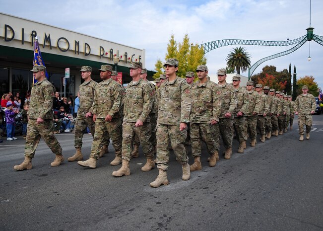 Airmen from the 9th Munitions Squadron, Beale AFB, Calif., march in the Veterans Day Parade in Marysville, Calif., November 11, 2011. More than 420 Airmen from Beale participated alongside other veterans, law enforcement, fire fighters and local groups. (U.S. Air Force photo by Airman 1st Class Shawn Nickel)