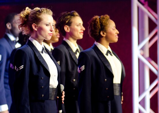 Airman 1st Class Kristen Walsh, left, and the Airmen of Tops in Blue perform Nov. 8, 2011, at Joint Base Lewis-McChord, Wash. Tops in Blue is an Air Force special unit which showcases the talent of some of the service's best Airmen. (U.S. Air Force photo/David Poe)