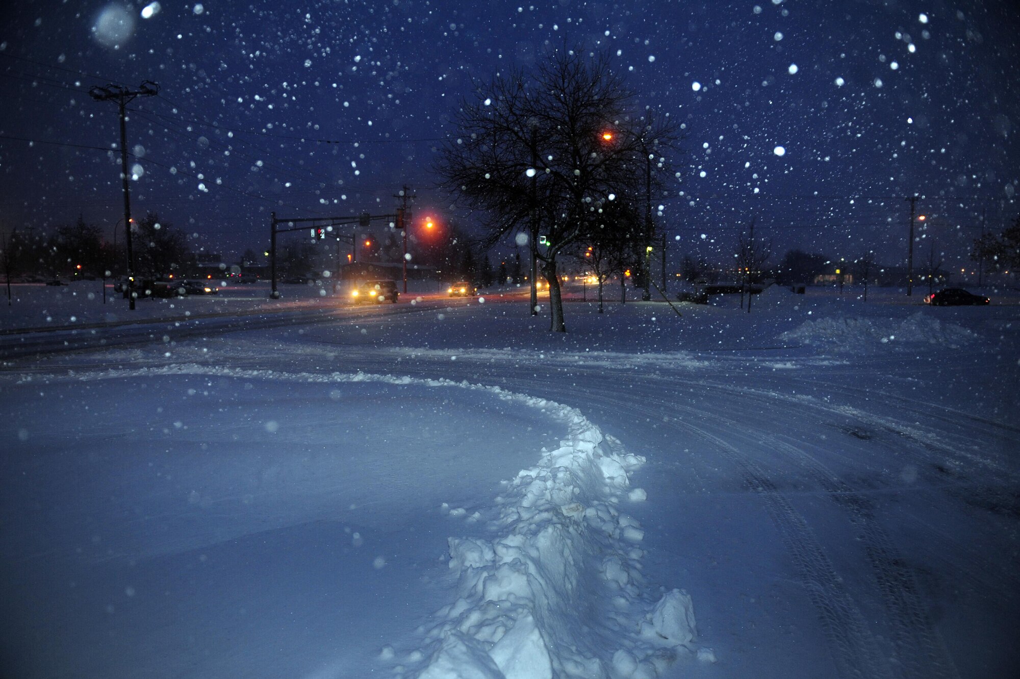 MINOT AIR FORCE BASE, N.D. -- Airmen travel into work during one of Minot’s first snowfalls this season here Nov. 15. Airmen should proceed cautiously to and from base during the coming winter months. (U.S. Air Force photo/Senior Airman Michael J. Veloz)
