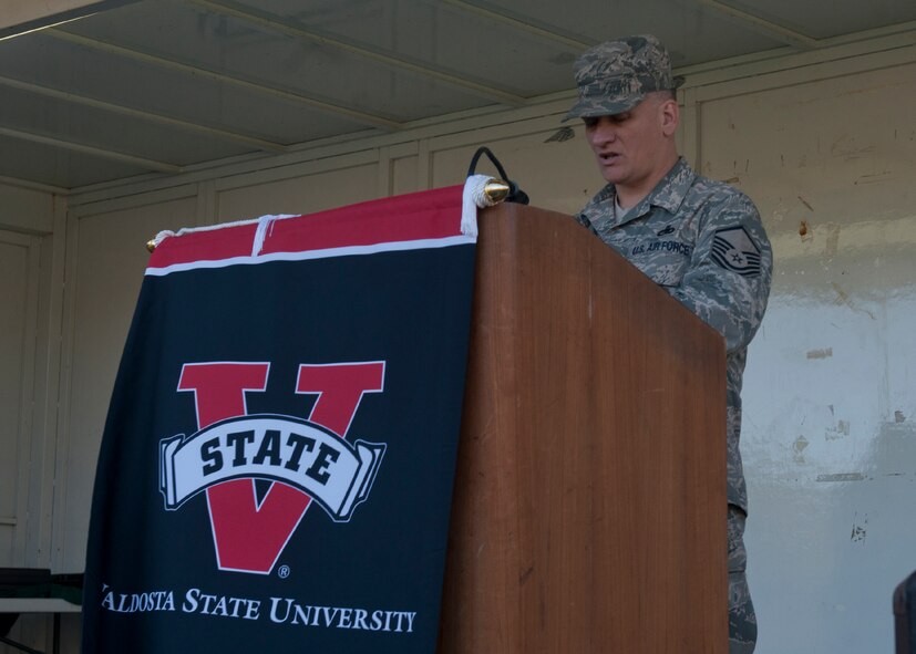 U.S. Air Force Master Sgt. Robert Emond, 23rd Equipment Maintenance Squadron, reads from a list of names of Americans who gave their lives in service to America in operations in Afghanistan and Iraq in honor of Veterans Day at Valdosta State University, Valdosta, Ga., Nov. 11, 2011. The remembrance day National Roll Call event was sponsored by VSU’s chapter of Student Veterans of America and lasted approximately six hours with volunteers taking turns reading the list consisting of 6,274 names. (U.S. Air Force photo by Senior Airman Eileen Meier/Released)