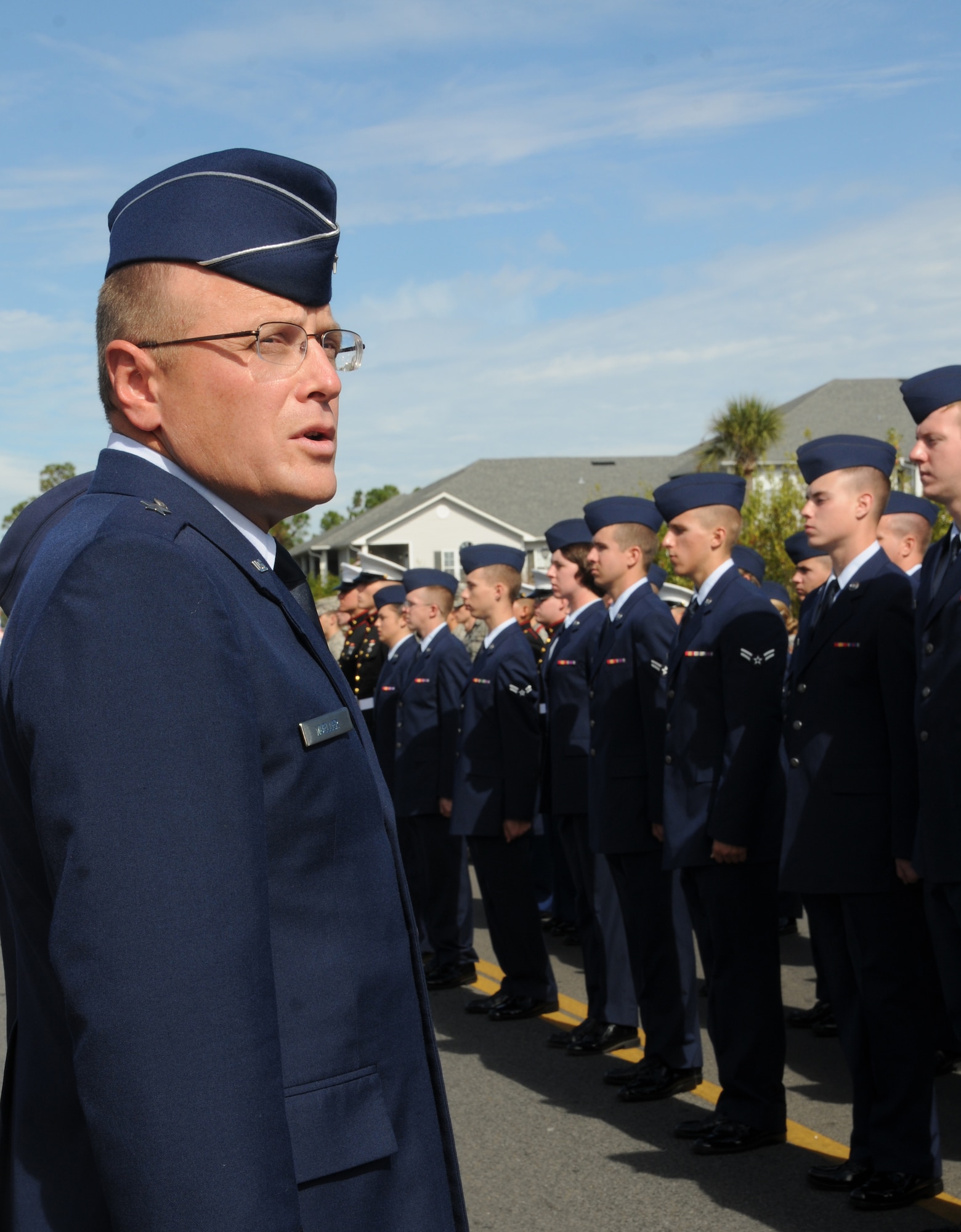 Brig. Gen. Andrew Mueller, Keesler Air Force Base commander, calls his troops to attention during the 11th Annual Gulf Coast Veterans Day Parade in D’Iberville, Miss., Nov. 12, 2011.  Other Keesler leadership also participated in the parade.  (U.S. Air Force photo by Kemberly Groue)