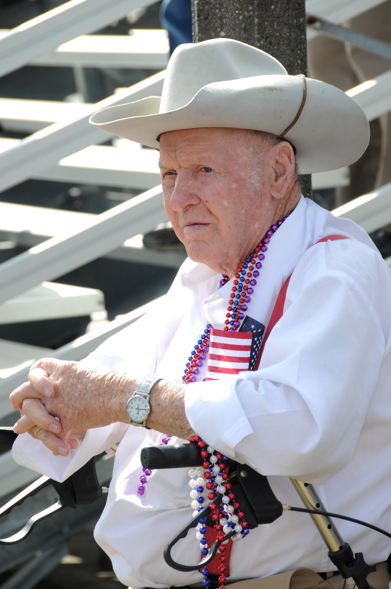 Jack Oxford, Navy and Air Force veteran, visits from the Armed Forces Retirement Home watch the 11th Annual Gulf Coast Veterans Day Parade in D’Iberville, Miss., Nov. 12, 2011.  (U.S. Air Force photo by Kemberly Groue)