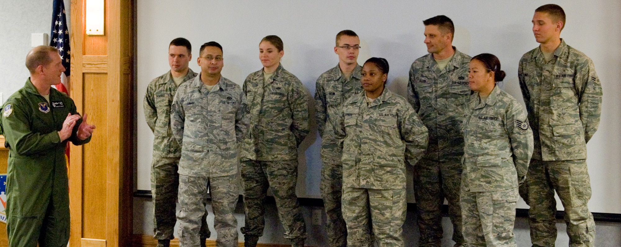 Col. Robert Stanley, 341st Missile Wing vice commander, introduced eight new members of the Sexual Assault Prevention and Response Victim Advocate team to wing leadership at the start of Wing Stand-Up on Nov. 9. Pictured from front to back, left to right are: Tech. Sgt. Ruben Sumaya, 819th RED HORSE Squadron; Tech. Sgt. Tiffany Sykes, 341st Medical Support Squadron; Staff Sgt. Rowena Hawley, 341st Civil Engineer Squadron; Airman 1st Class Adam Roberts; 341st Logistics Readiness Squadron; 2nd Lt. Jessica White, 341st Contracting Squadron; Airman 1st Class Brandon Biehn, 341st CES; Tech. Sgt. Don Allen, 341st CES; and Airman 1st Class Jacob Heinz, 341st CES.