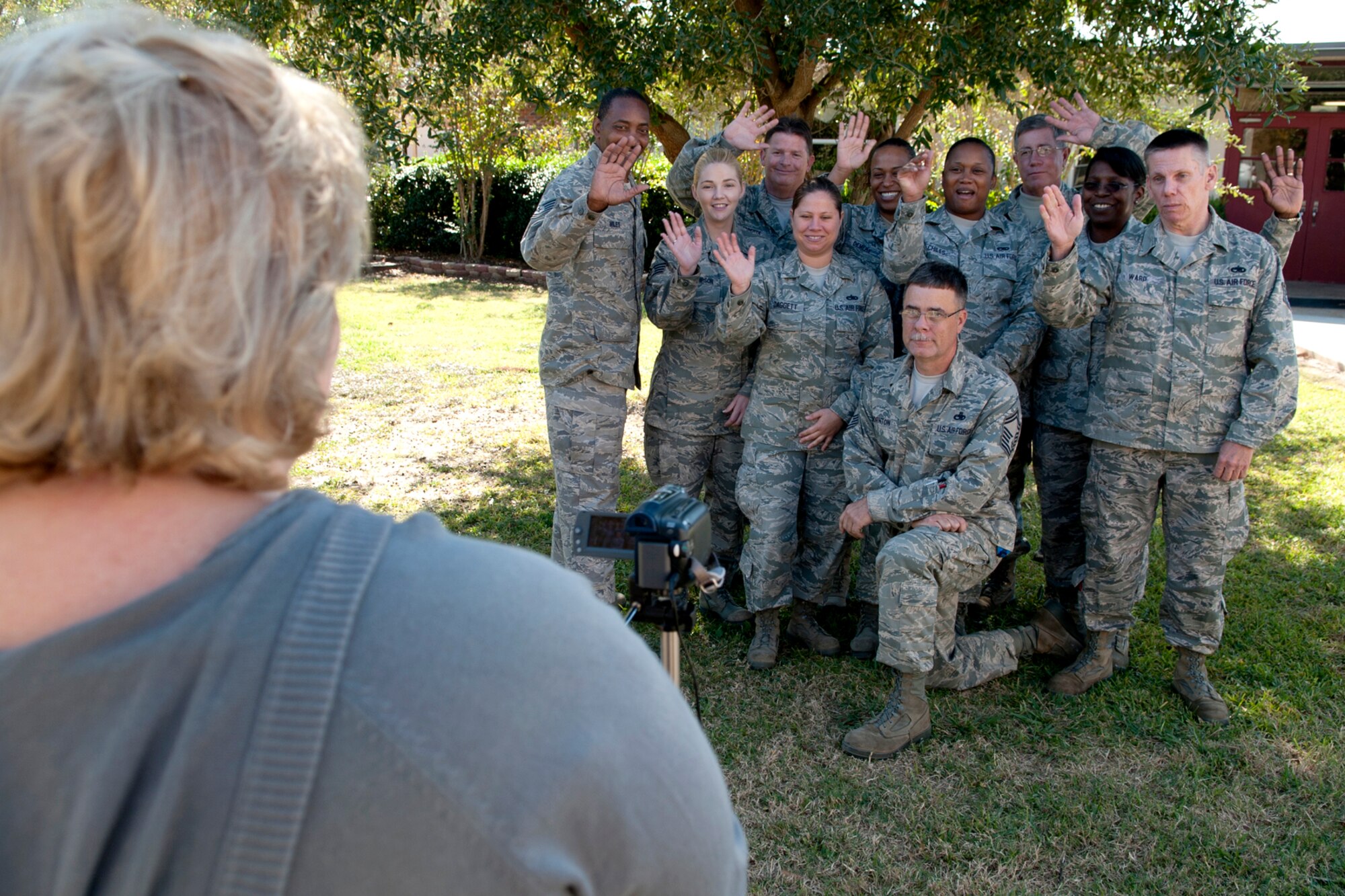 Members of the 917th Fighter Group record a goodbye message to the Phoenix Magnet Elementary students before departing for Barksdale Air Force Base, La., Nov. 10, 2011. The message will be played through the school's video system allowing each classroom to see. (U.S. Air Force photo by Master Sgt. Greg Steele/Released)