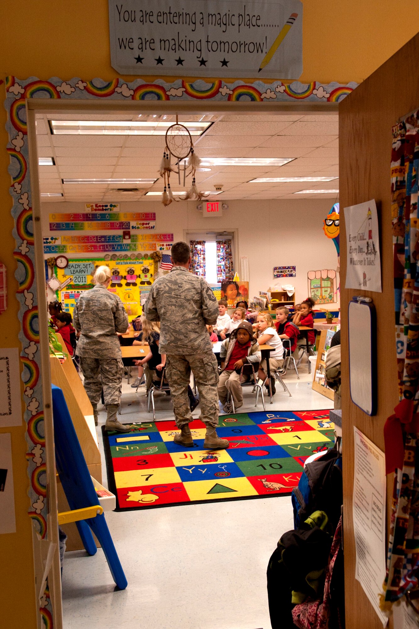U.S. Air Force members interact with students at the Phoenix Magnet Elementary School, Alexandria, La., Nov. 10, 2011. The school hosted a group of 917th Fighter Group personnel, who visited all 675 students, answering questions about themselves, their jobs and the Air Force Reserve. (U.S. Air Force photo by Master Sgt. Greg Steele/Released)